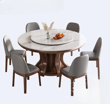 Модерна проста кръгла каменна плоча маса за хранене и столове, съчетани с масивна дървесина голям колан грамофон ресторант